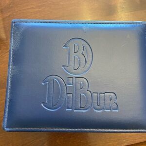 DiBur woman’s stainless steel watch with authentic stingray band.